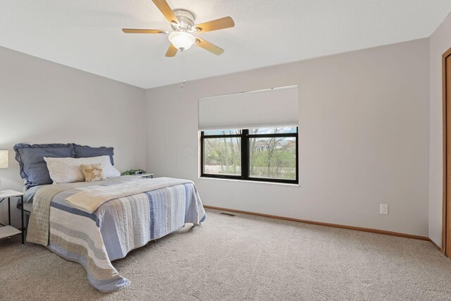 1581 Ringfield Dr, Galloway, OH 43119 - bedroom featuring ceiling fan, baseboards, and carpet floors