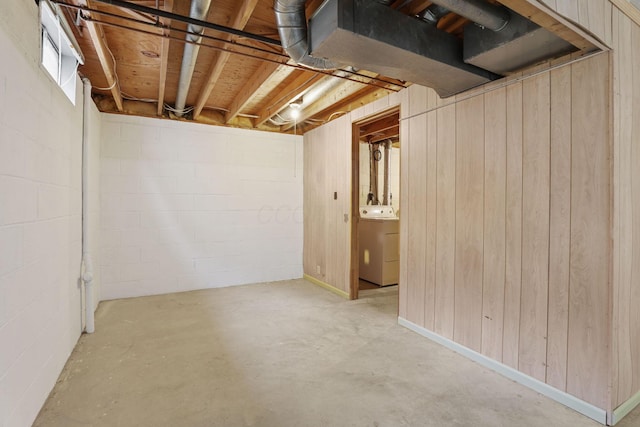 1581 Ringfield Dr, Galloway, OH 43119 - basement with wooden walls and washer / dryer