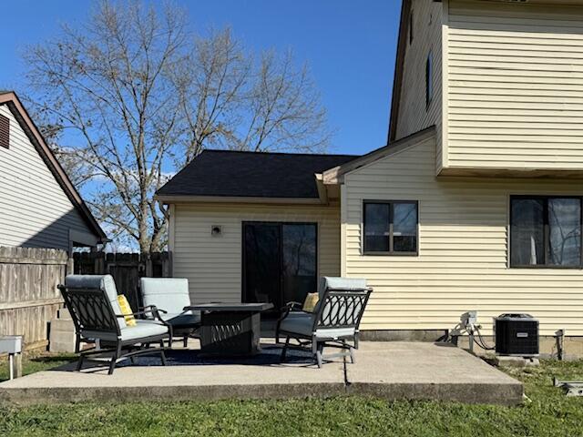 1581 Ringfield Dr, Galloway, OH 43119 - back of house with a patio area and fence
