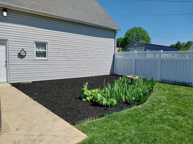 749 Jefferson St, Greenfield, OH 45123 - view of property exterior featuring a shingled roof and an outbuilding