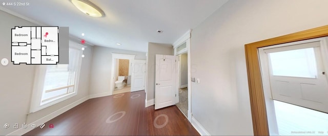 444 S 22nd St, Columbus, OH 43205 - hall featuring dark wood finished floors and baseboards