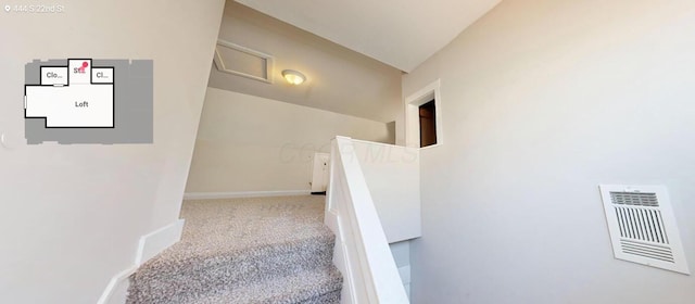 444 S 22nd St, Columbus, OH 43205 - staircase featuring lofted ceiling, carpet floors, and baseboards