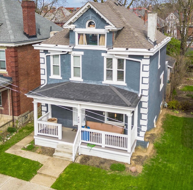 444 S 22nd St, Columbus, OH 43205 - victorian home with a chimney, covered porch, brick siding, and roof with shingles