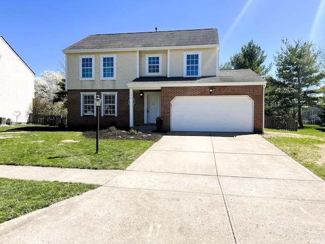 796 Village Park Dr, Powell, OH 43065 - traditional home featuring concrete driveway, a front yard, stucco siding, and brick siding