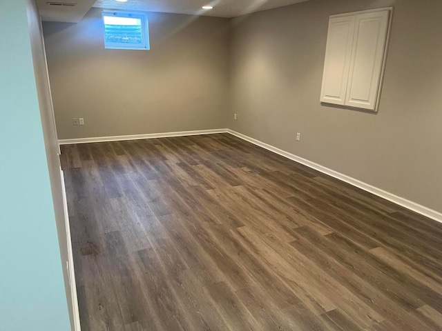 796 Village Park Dr, Powell, OH 43065 - spare room with dark wood-type flooring and baseboards
