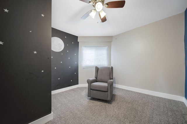 unfurnished room featuring baseboards, a ceiling fan, and carpet flooring