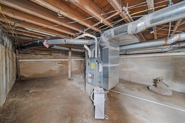 unfinished basement with heating unit