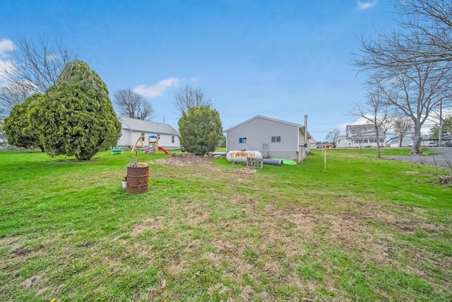 view of yard featuring a playground