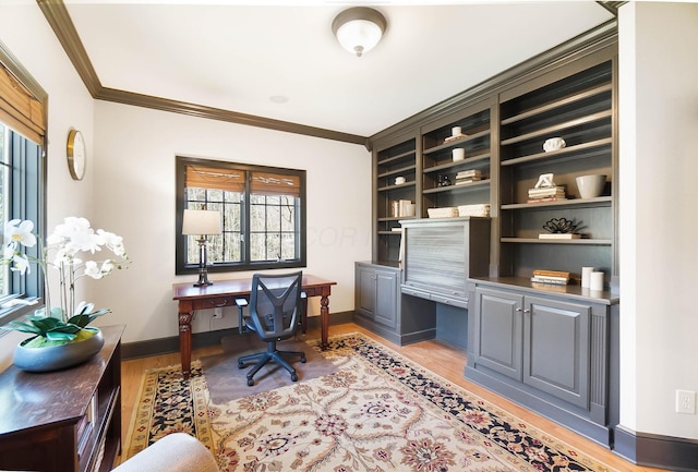 6795 Macneil Dr, Dublin, OH 43017 - office space with built in desk, light wood finished floors, baseboards, and ornamental molding