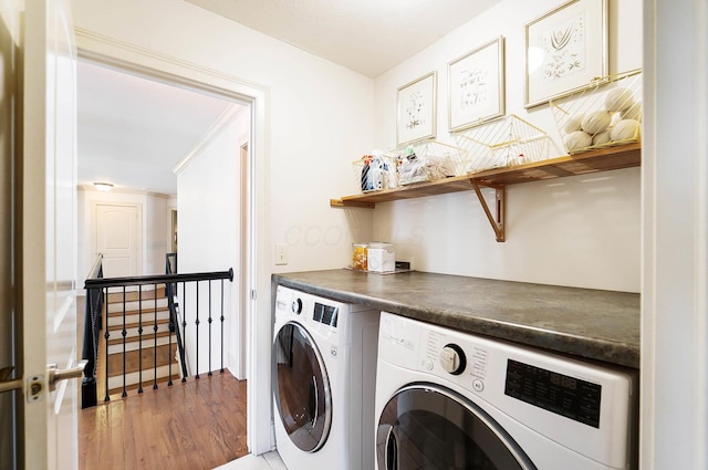 6795 Macneil Dr, Dublin, OH 43017 - laundry room featuring laundry area, wood finished floors, and washer and clothes dryer