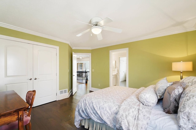6795 Macneil Dr, Dublin, OH 43017 - bedroom with dark wood-type flooring, visible vents, a closet, and ornamental molding
