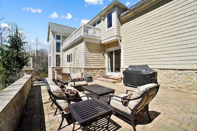6795 Macneil Dr, Dublin, OH 43017 - view of patio featuring grilling area, entry steps, outdoor lounge area, and a balcony