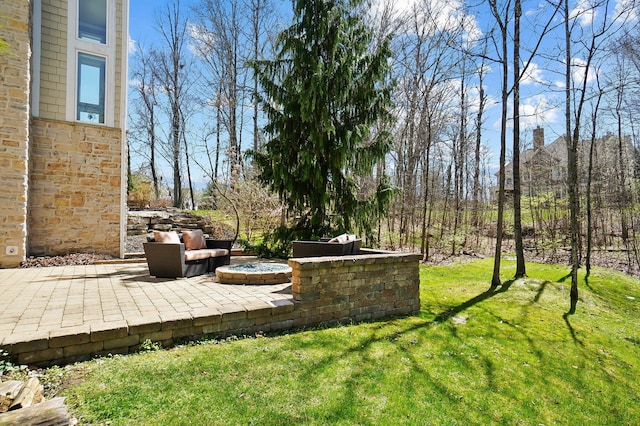6795 Macneil Dr, Dublin, OH 43017 - view of yard with an outdoor fire pit and a patio area