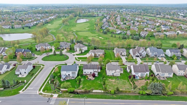 bird's eye view with a residential view, view of golf course, and a water view