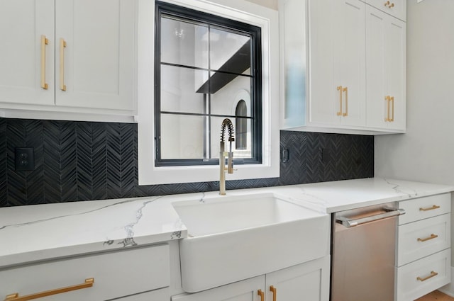 10007 Allen Dr, Dublin, OH 43017 - kitchen with a sink, dishwasher, white cabinets, and decorative backsplash