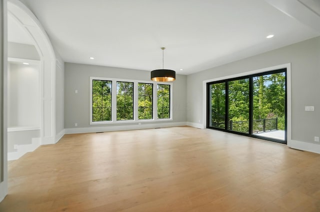 10007 Allen Dr, Dublin, OH 43017 - empty room featuring baseboards, light wood-style floors, and recessed lighting
