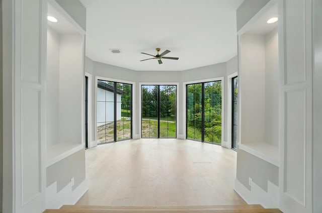 10007 Allen Dr, Dublin, OH 43017 - unfurnished room featuring a ceiling fan, recessed lighting, and wood finished floors
