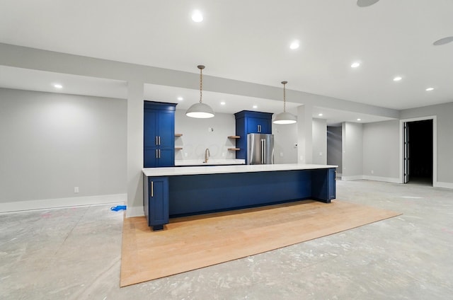 10007 Allen Dr, Dublin, OH 43017 - kitchen with blue cabinets, freestanding refrigerator, open shelves, concrete floors, and light countertops