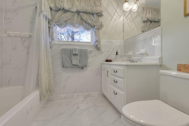 6693 Red Coach Ln, Reynoldsburg, OH 43068 - full bathroom with tile walls, vanity, toilet, marble finish floor, and shower / tub combo with curtain