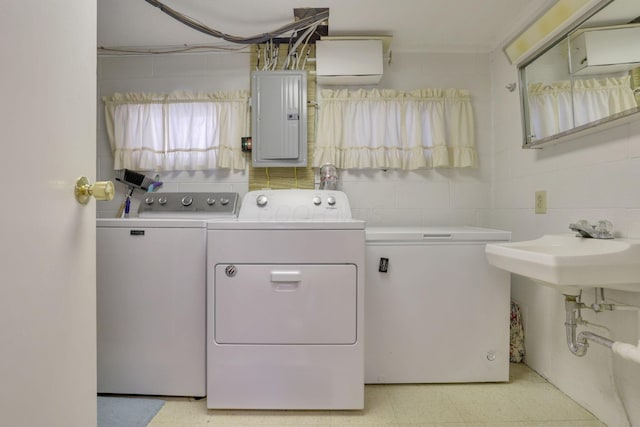 6693 Red Coach Ln, Reynoldsburg, OH 43068 - washroom with electric panel, independent washer and dryer, and light floors