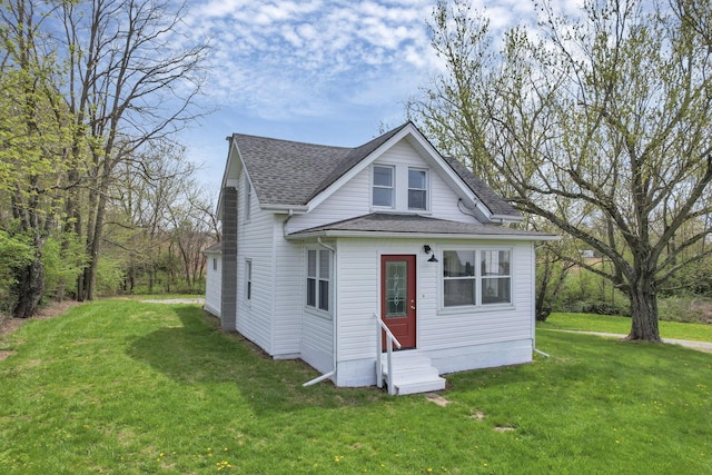 8400 16th Rd Unit Sw, Amanda, OH 43102 - view of front facade featuring entry steps, roof with shingles, and a front lawn