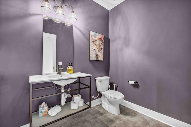 362-366 Zimpfer St Unit 1-3, Columbus, OH 43206 - bathroom with toilet, baseboards, and a sink
