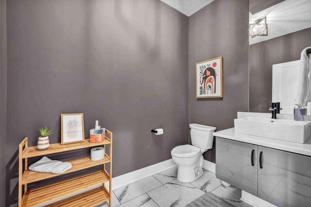 362-366 Zimpfer St Unit 1-3, Columbus, OH 43206 - half bath with marble finish floors, baseboards, toilet, and vanity