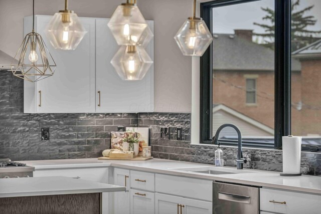 362-366 Zimpfer St Unit 1-3, Columbus, OH 43206 - kitchen with a sink, stainless steel dishwasher, white cabinets, and backsplash