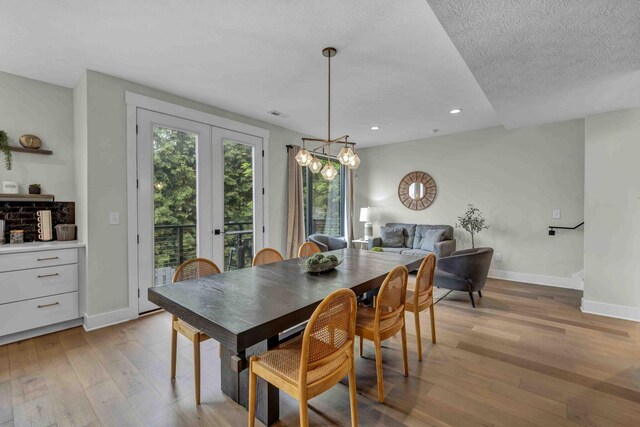 362-366 Zimpfer St Unit 1-3, Columbus, OH 43206 - dining space with light wood-style floors, baseboards, french doors, a chandelier, and recessed lighting