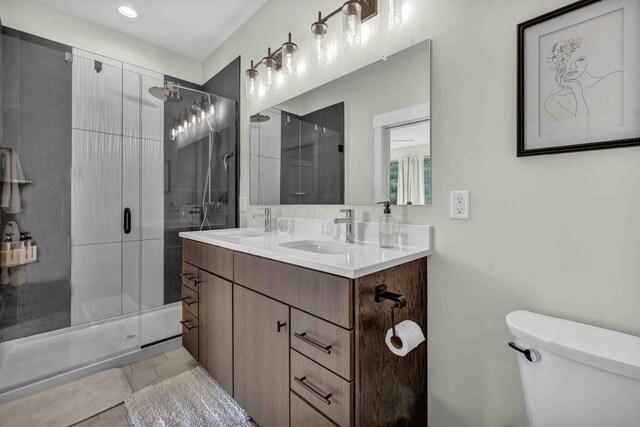 362-366 Zimpfer St Unit 1-3, Columbus, OH 43206 - bathroom with a stall shower, toilet, double vanity, and recessed lighting
