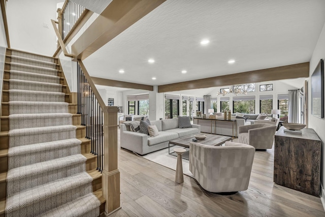 living area with stairway, recessed lighting, and light wood finished floors