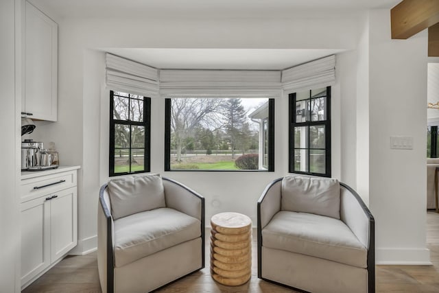 sitting room featuring wood finished floors and baseboards