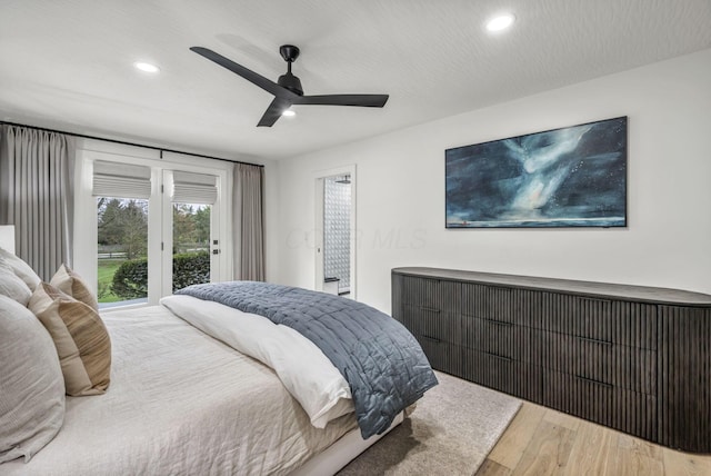 bedroom featuring recessed lighting, a ceiling fan, access to outside, and wood finished floors