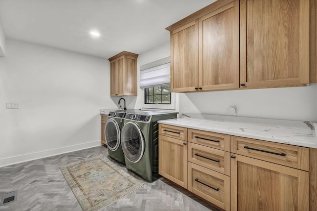laundry room featuring recessed lighting, separate washer and dryer, cabinet space, baseboards, and visible vents