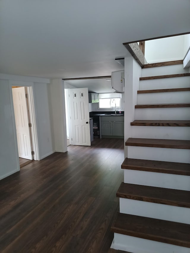 126 7th St, Lancaster, OH 43130 - stairway with wood finished floors and baseboards