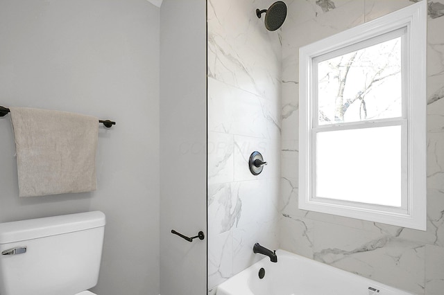 full bath featuring washtub / shower combination and toilet