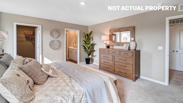 6322 S Marinelli Dr, Columbus, OH 43228 - bedroom featuring light carpet, visible vents, a closet, and baseboards