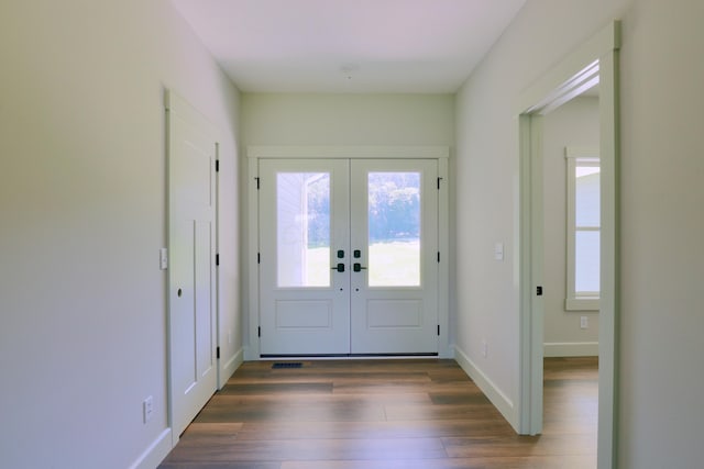 3597 Country Club Rd SW, Lancaster, OH 43130 - foyer featuring french doors, healthy amount of natural light, and dark wood-style floors