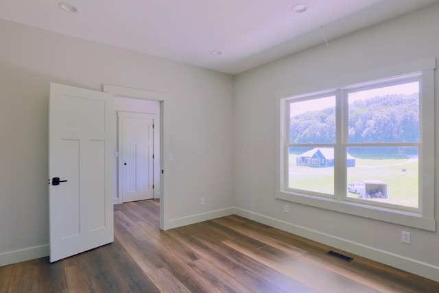 3597 Country Club Rd SW, Lancaster, OH 43130 - spare room featuring dark wood-type flooring and recessed lighting
