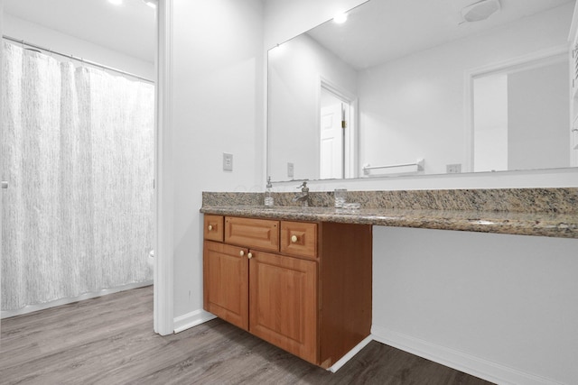 4899 Common Market Pl, Dublin, OH 43016 - full bathroom featuring vanity, wood finished floors, and a shower with shower curtain