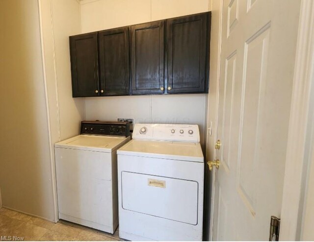 6243 Branch Cir, Zanesville, OH 43701 - laundry room with cabinet space and washing machine and clothes dryer