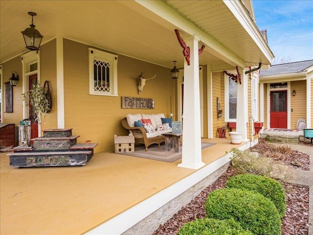 view of patio featuring an outdoor living space and covered porch