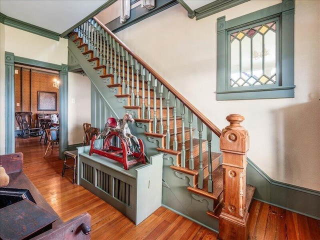 stairway with wood-type flooring