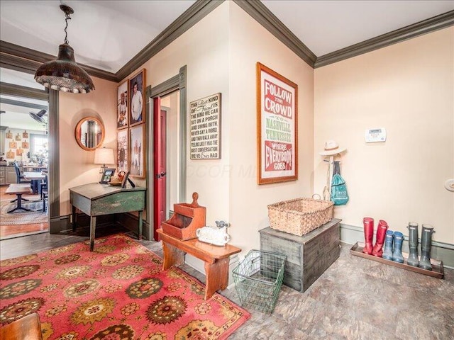 hallway with baseboards and ornamental molding