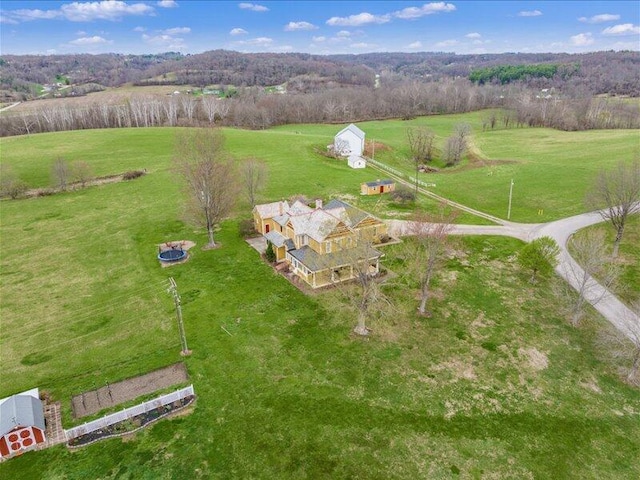 birds eye view of property featuring a rural view