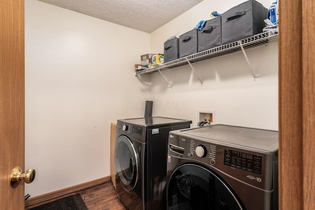 3073 Kola Way, Columbus, OH 43219 - washroom with laundry area, independent washer and dryer, a textured ceiling, wood finished floors, and baseboards