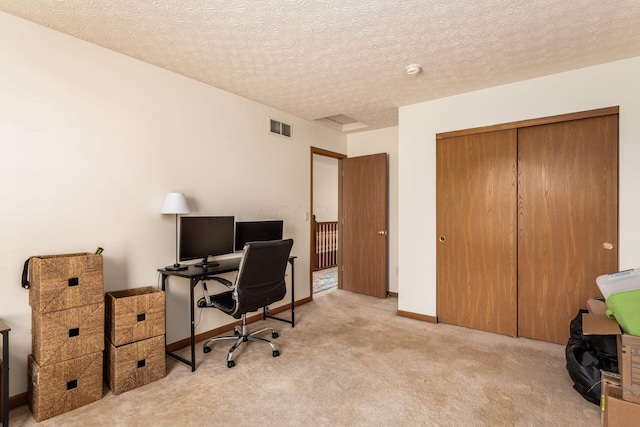 3073 Kola Way, Columbus, OH 43219 - office space with visible vents, baseboards, carpet flooring, and a textured ceiling