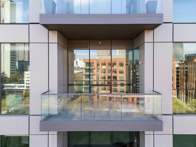 225 John H Mcconnell Blvd Unit 705, Columbus, OH 43215 - exterior space featuring stucco siding and a balcony