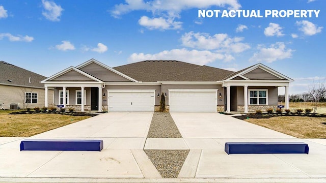 craftsman-style home with an attached garage, a porch, stone siding, concrete driveway, and a front lawn