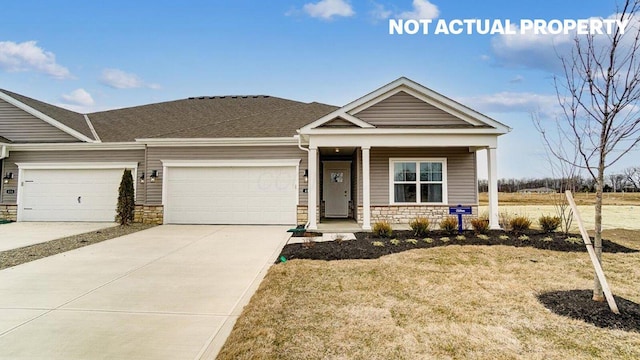view of front facade with driveway, stone siding, and an attached garage